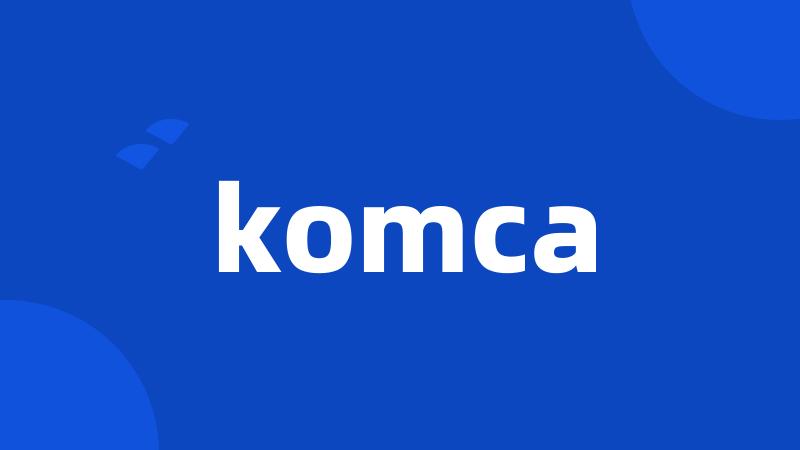 komca